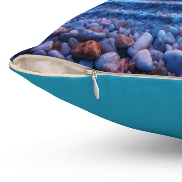 A close up of the pillow with rocks on it