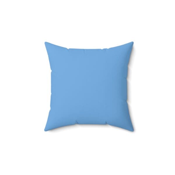A light blue pillow with a white background
