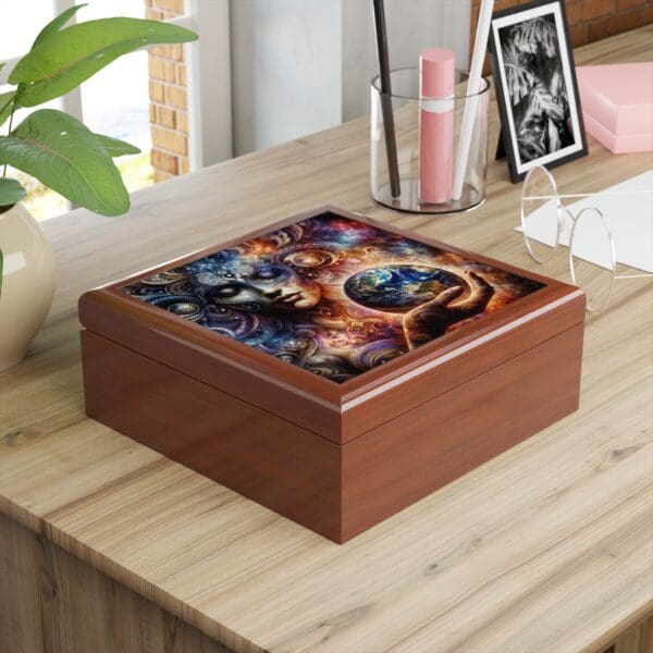 A wooden box with a picture of planets on it.
