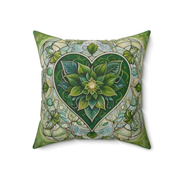 A green heart with leaves and vines on it.